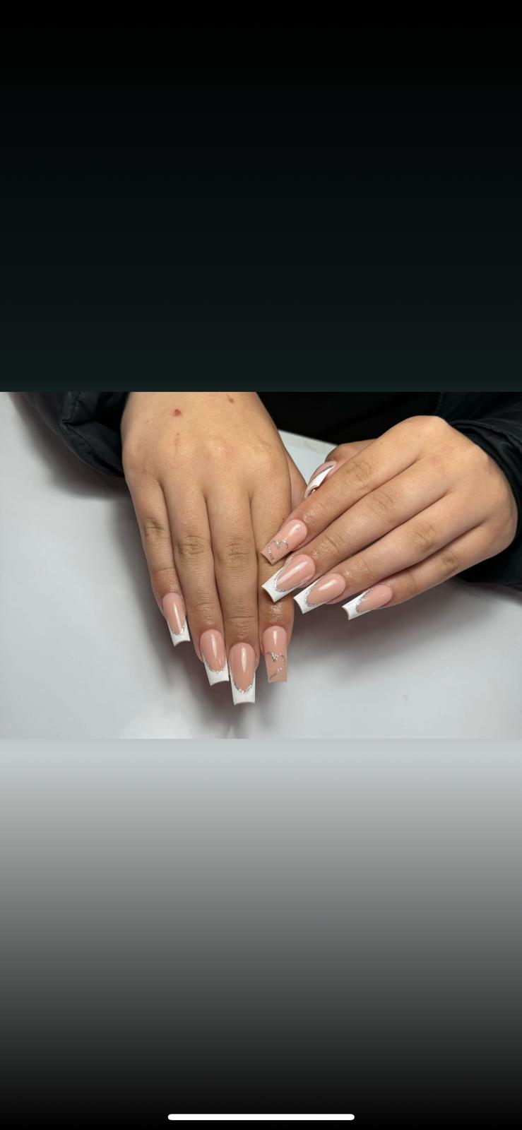 Long white French tips with silver details
